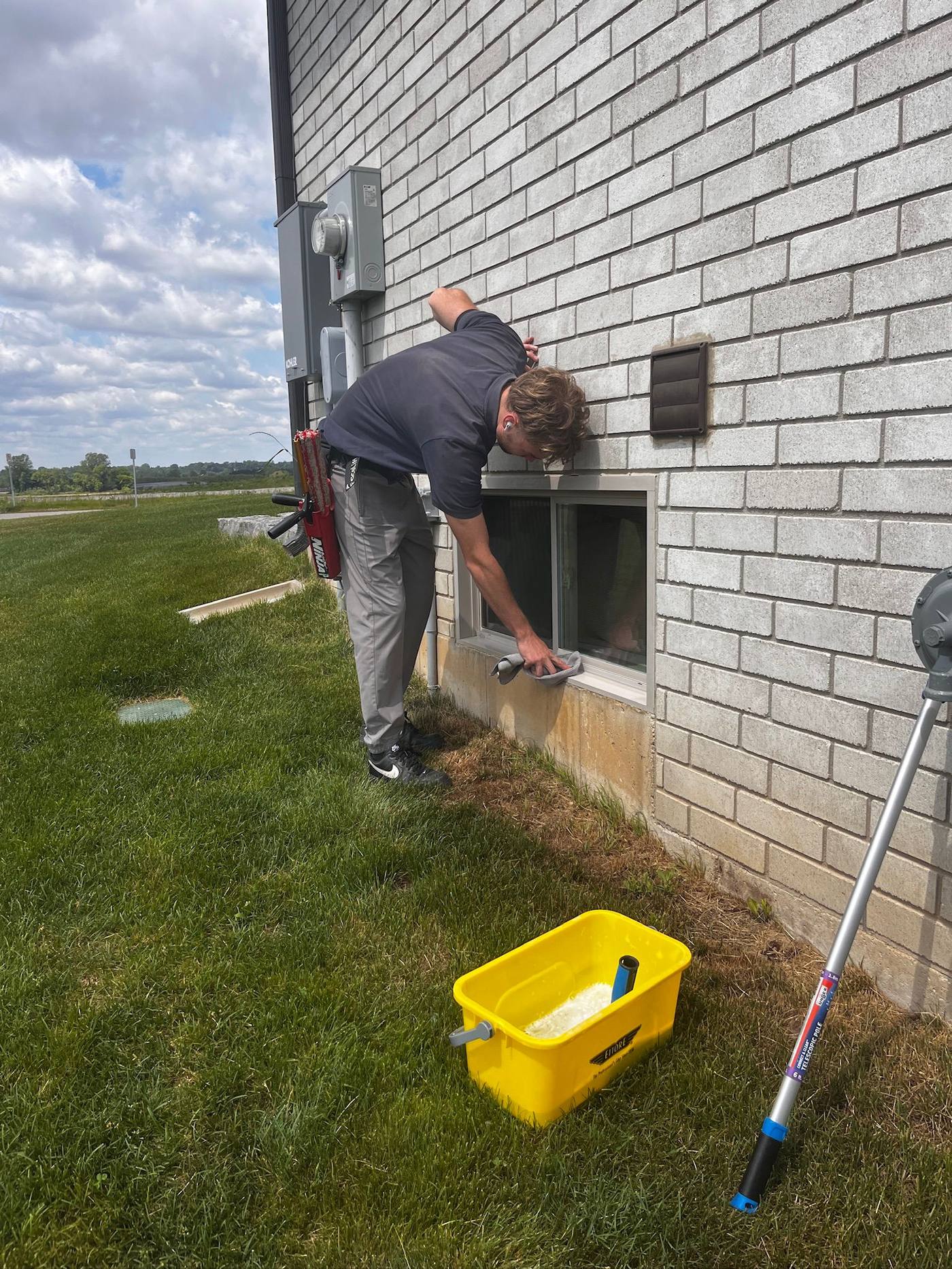Detailing a low window on a commercial brick building