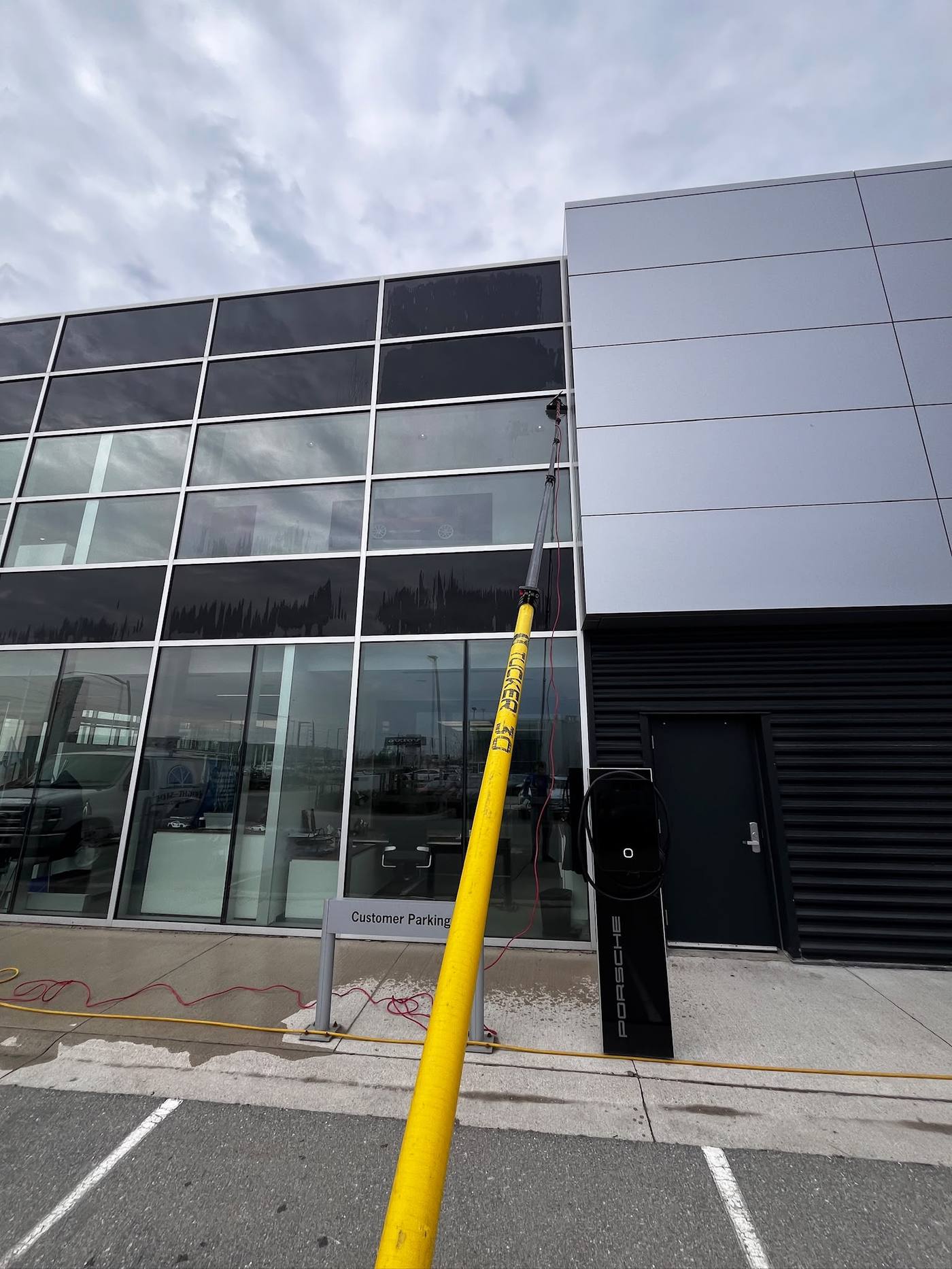 Cleaning the entrance glass of a commercial unit