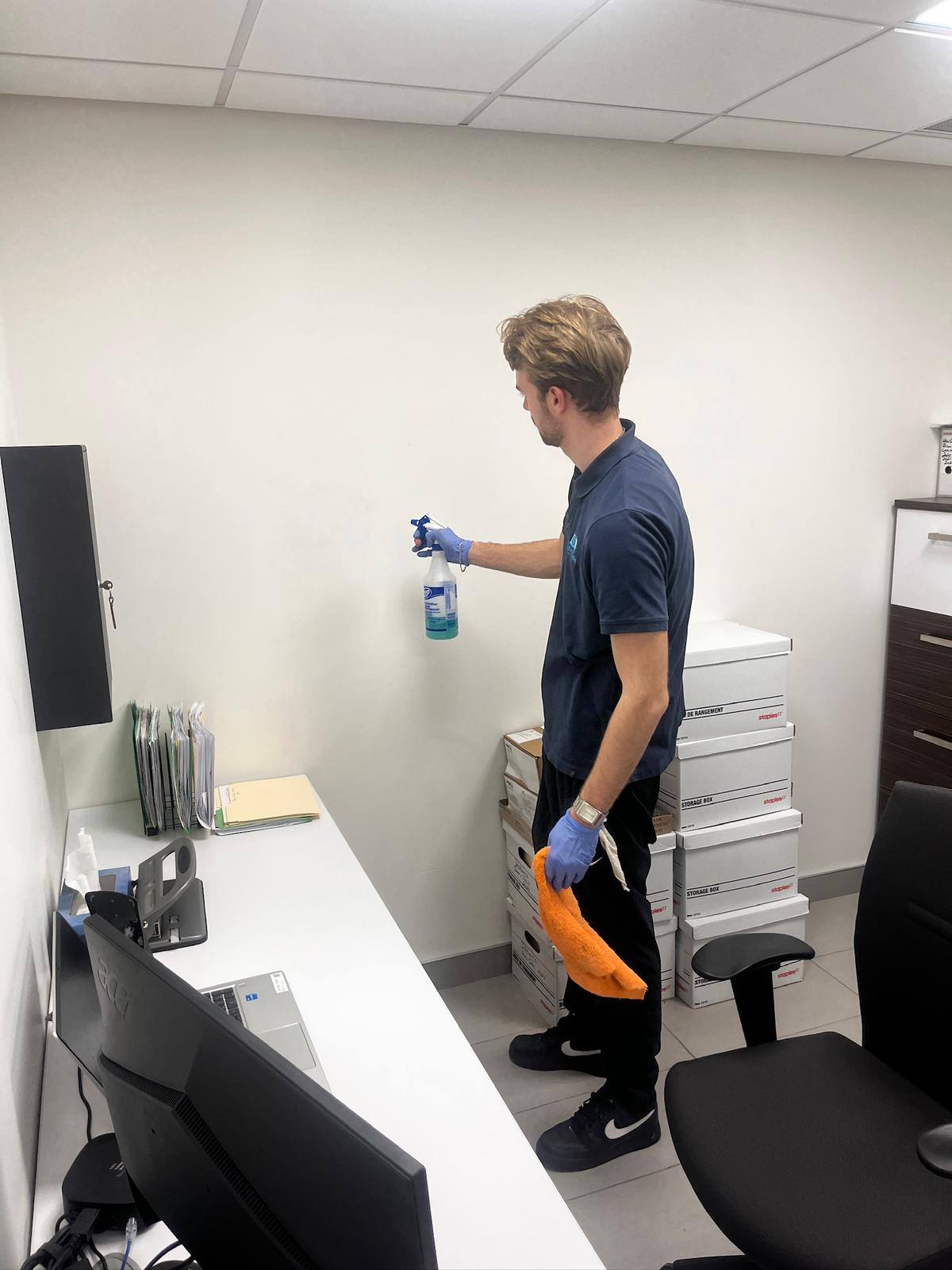 Cleaning a reception counter in a commercial office